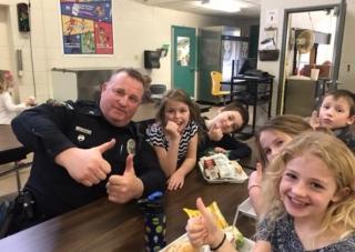 Officer Shaw with the AEMS children